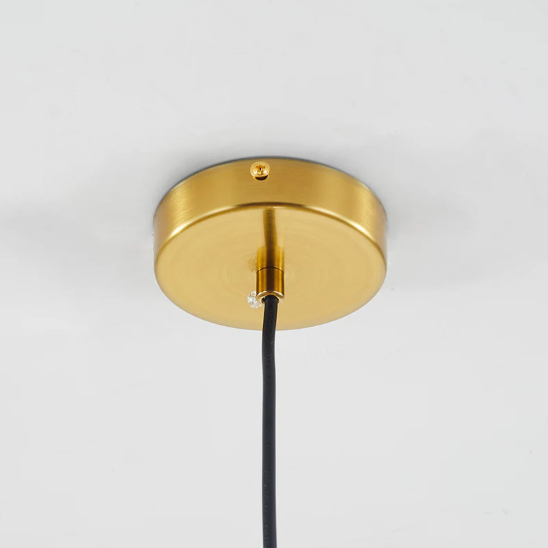 Modern spherical LED pendant light for living room. Aurora Sphere warm white glow.