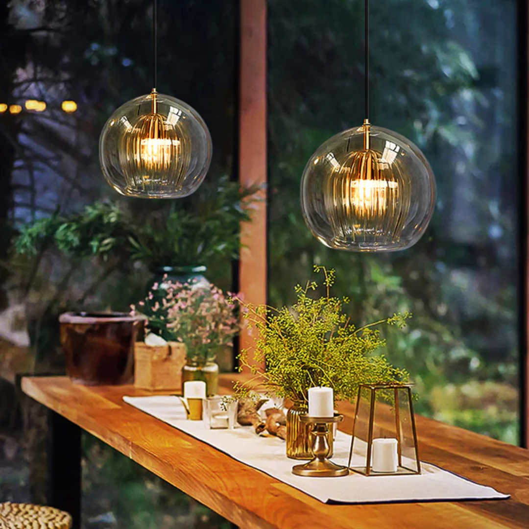 Enhance your home with Aurora Sphere, a modern spherical LED pendant light. Warm white glow.