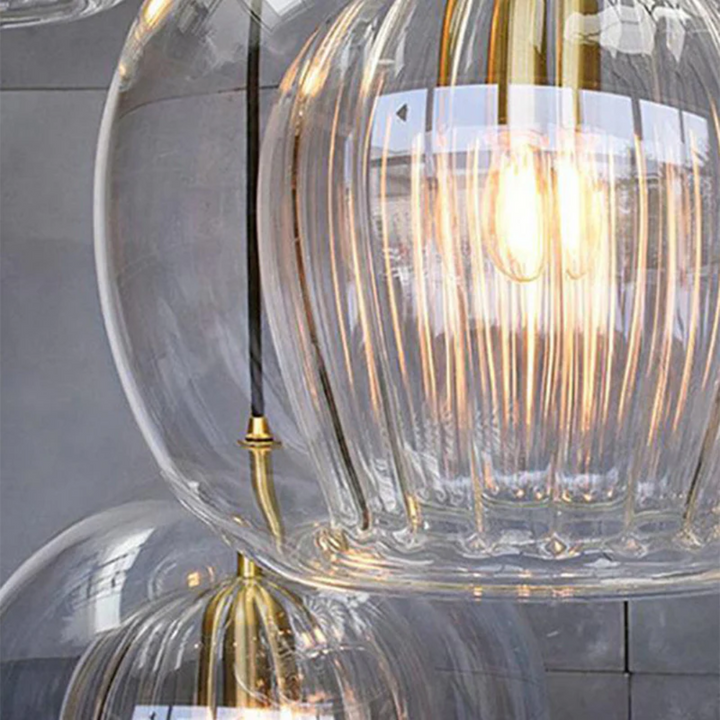 Elegant Aurora Sphere spherical LED light fixture, enhancing modern decor. Warm white.