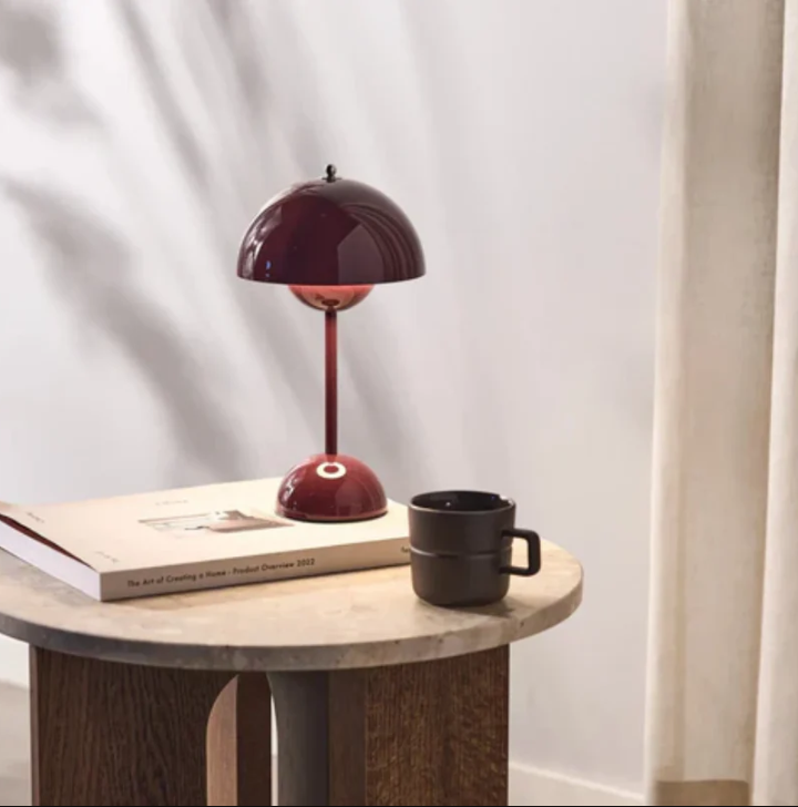 Dimmable LED desk lamp. Modern touch-control lighting for office, bedroom, or contemporary home decor.