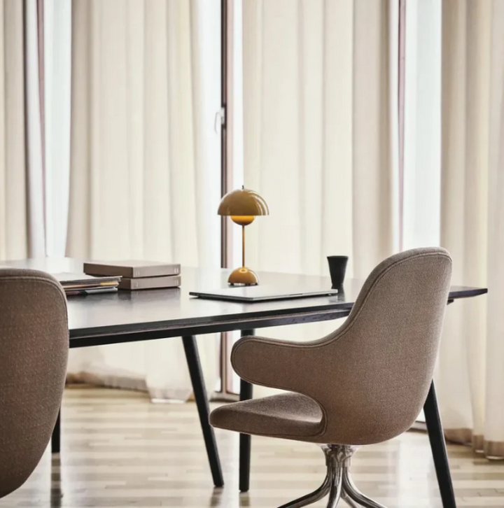 Contemporary touch-control LED table lamp. Dimmable, modern lighting for desks, homes, and offices.