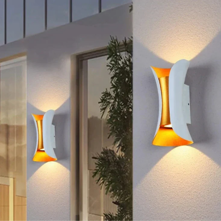 Modern waterproof LED wall light, sleek aluminium, IP65 rating, indoor/outdoor use, warm white glow, available in black.