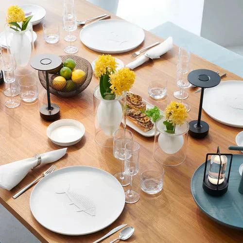 Stylish GlowBeam table lamp, dimmable and wireless, for modern home ambiance in living rooms or bedrooms.