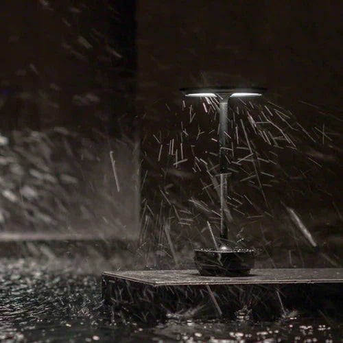 Contemporary GlowBeam table lamp, wireless with dimmable light, enhancing bedrooms & living rooms.