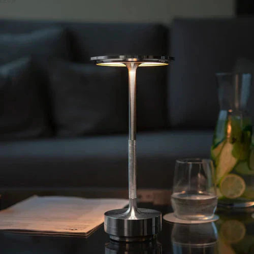 Sleek GlowBeam design lamp, dimmable and portable, perfect for modern living room or bedroom lighting.