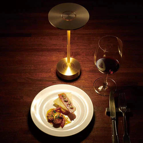 Elegant GlowBeam wireless table lamp with USB rechargeable battery, providing versatile portable light.