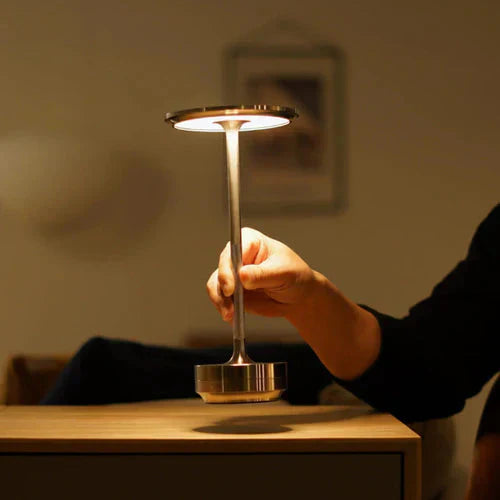 Dimmable modern design lamp, GlowBeam, a USB rechargeable portable light for any contemporary home.