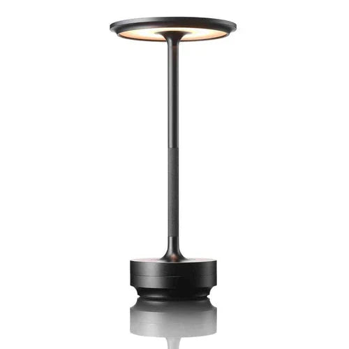 Compact and stylish GlowBeam portable light, USB rechargeable, ideal for bedroom or living room tables.