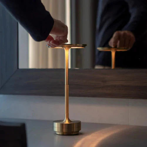 USB rechargeable GlowBeam table lamp, elegant and wireless, providing flexible ambient lighting solutions.