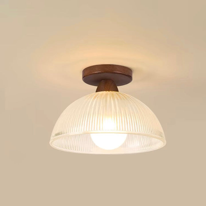 "Modern wooden and glass ceiling lamp, sleek design, natural wood tones, ideal for contemporary home decor lighting."
