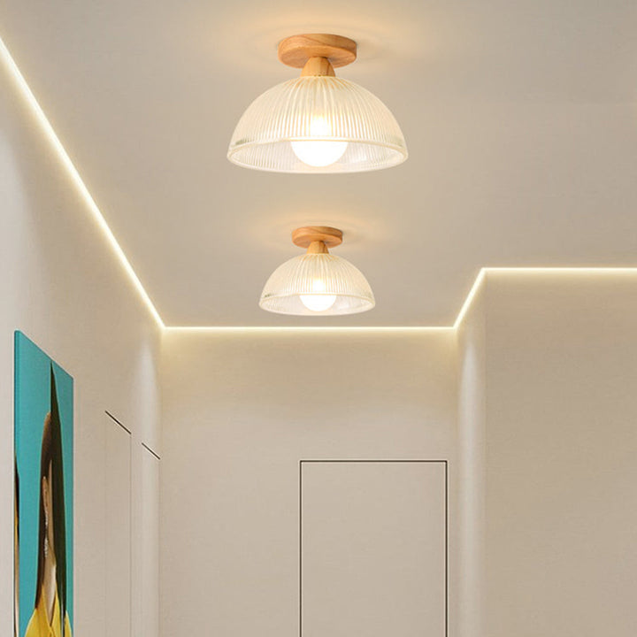"Modern wooden and glass ceiling lamp, sleek design, natural wood tones, ideal for contemporary home decor lighting."