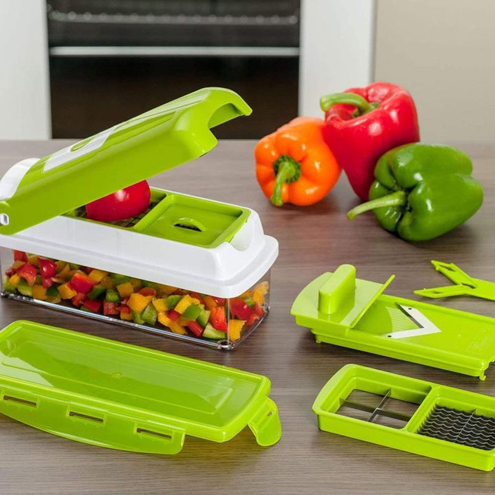 Versatile vegetable dicer, grater & slicer with interchangeable blades for easy meal prep tasks.