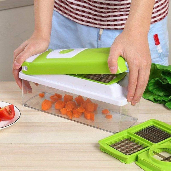 Handheld vegetable chopper in use, dicing onions quickly for cooking. An essential kitchen tool.
