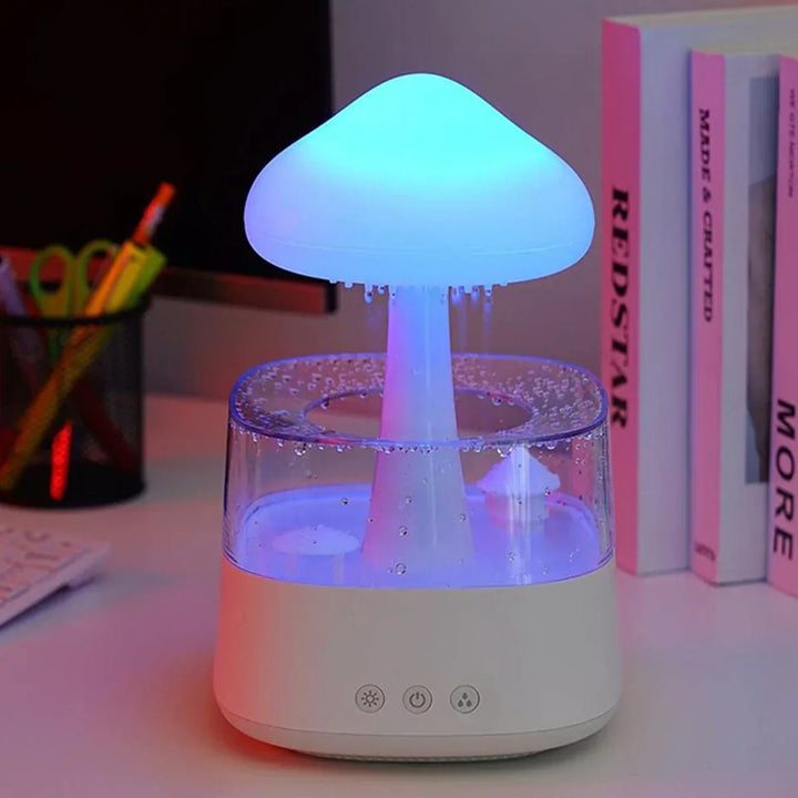 Innovative mushroom rain cloud diffuser & humidifier. Creates a serene ambiance with relaxing rain sounds and a soft night light.
