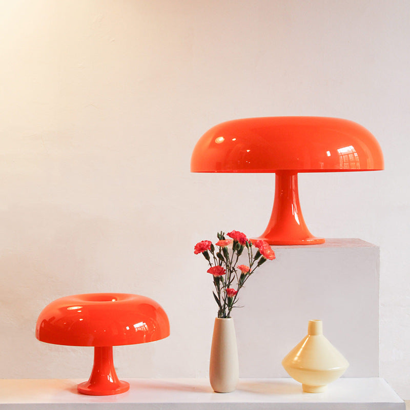 "Mushroom-shaped minimalist table lamp with LED, Nordic design, in white and orange; perfect for modern interiors."