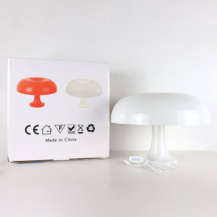 "Mushroom-shaped minimalist table lamp with LED, Nordic design, in white and orange; perfect for modern interiors."