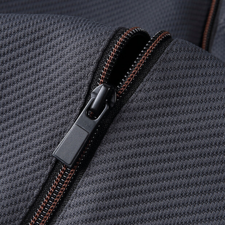 "Navy and black men's tracksuit set with zip jacket and joggers, showcasing sleek design and comfort for casual or gym wear."