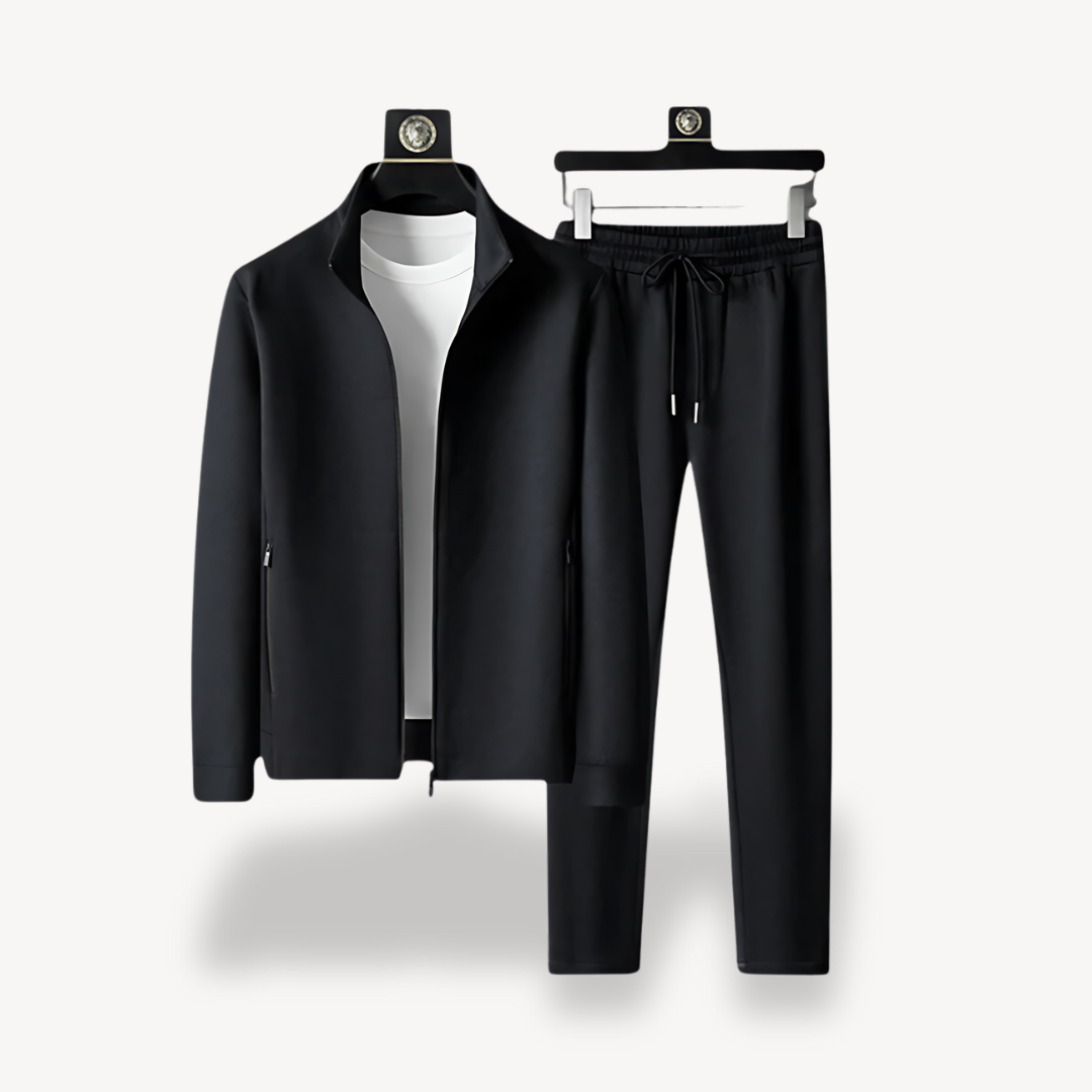 "Navy and black men's tracksuit set with zip jacket and joggers, showcasing sleek design and comfort for casual or gym wear."