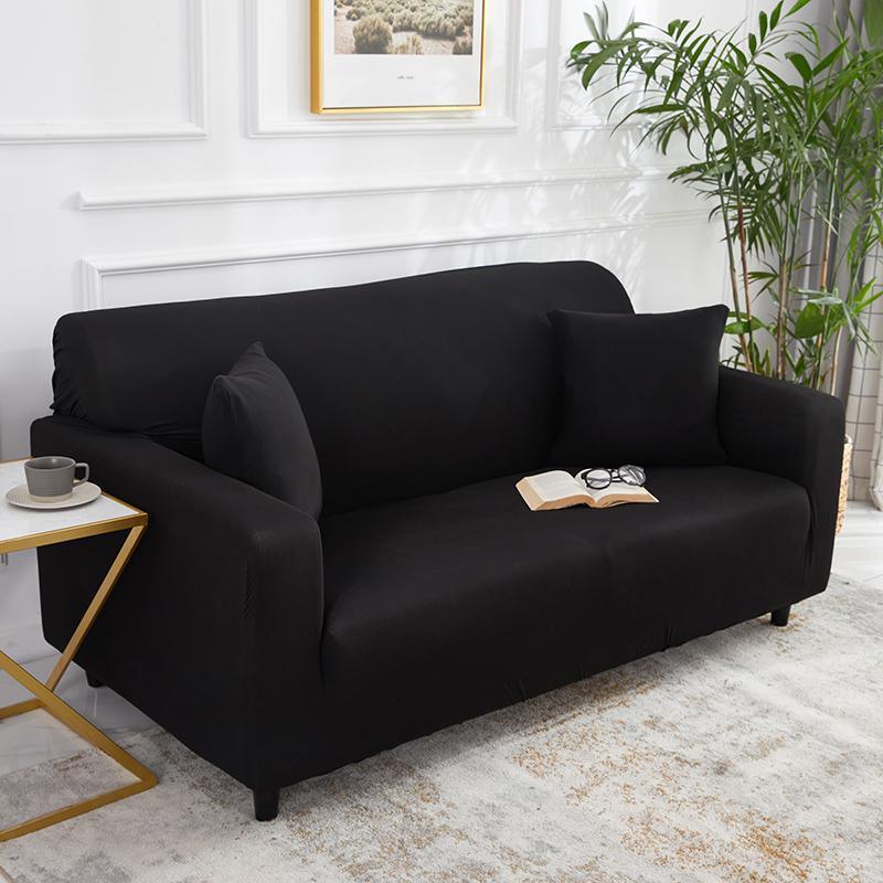 "Noir stretchable sofa cover in solid color, showcasing sleek fit and elegant style for versatile home decoration."