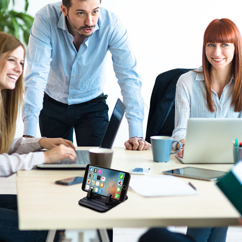 Non-slip silicone phone holder for car dashboard, secure grip in black or rose red, perfect for safe hands-free driving.