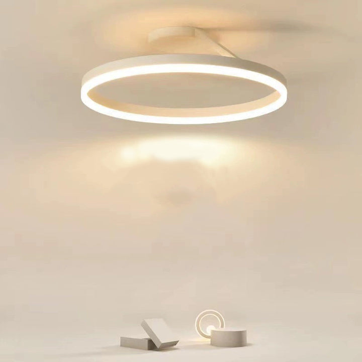 Nordic minimalist LED ceiling light with sleek metal iron and acrylic design, perfect for modern living room illumination.