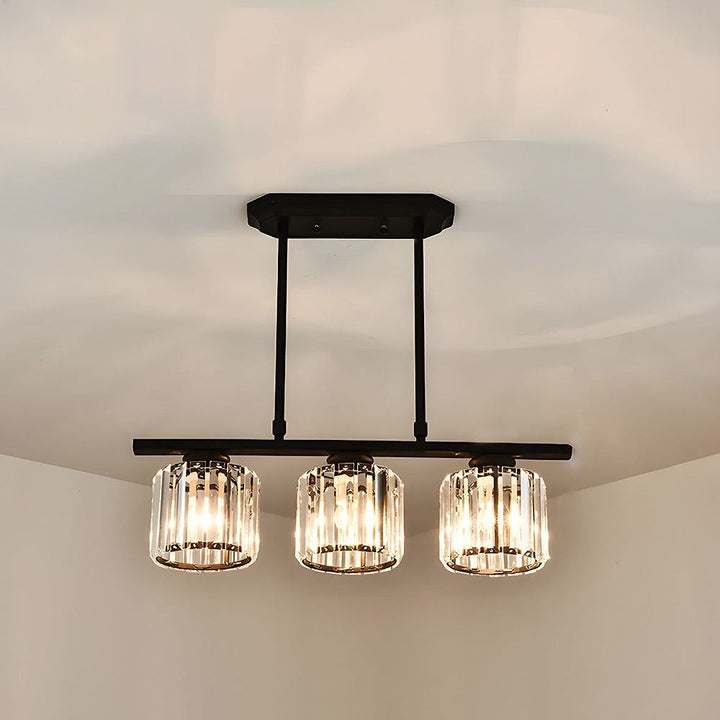 "Nordic multi-light glass pendant lamp with elegant glass shades, perfect for kitchen island or dining area centerpiece."
