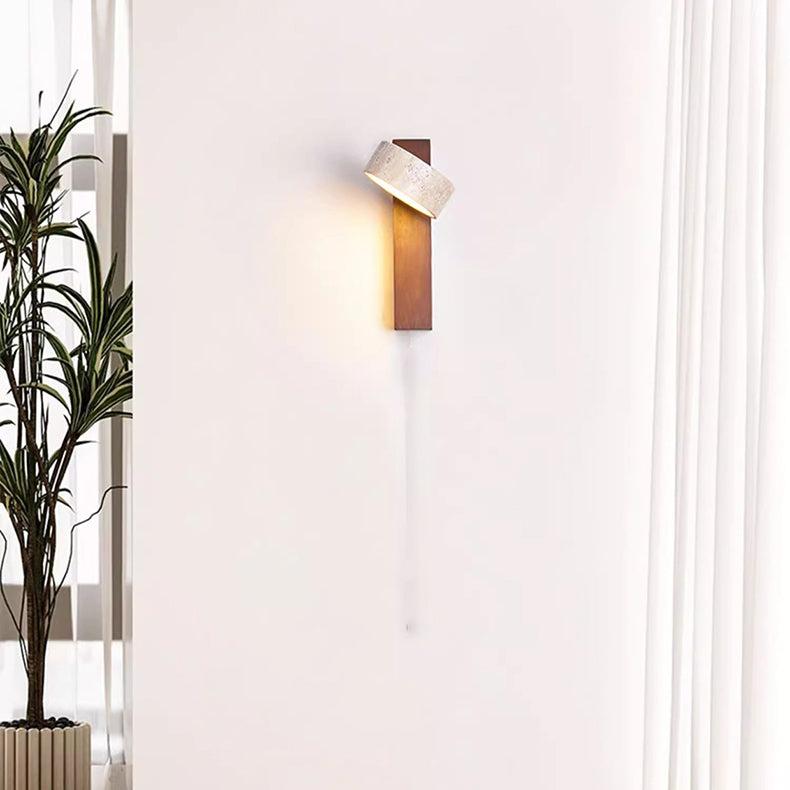 "Off-white travertine wall lamp with LED light, minimalist design, wood accents, ideal for ambient bedroom lighting."