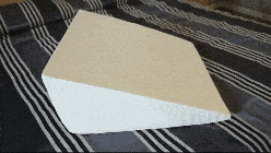 Orthopaedic triangle wedge pillow in white, offering reflux relief, post-surgery support, improves posture and circulation.