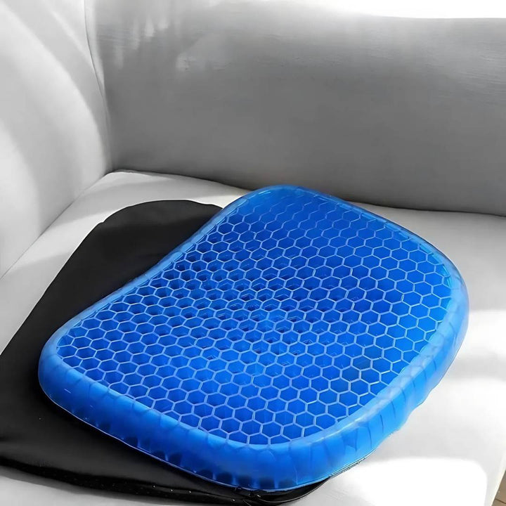 Orthopedic gel seat cushion for pressure relief, blue with ergonomic design, ideal for office chairs and tailbone support.