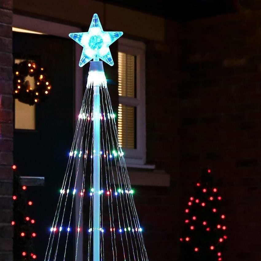 Spectacular outdoor Christmas tree light show with animated multicolor LED holiday lights.