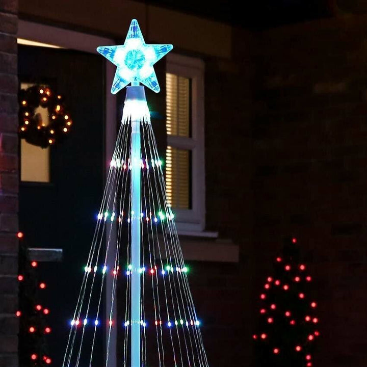 Spectacular outdoor Christmas tree light show with animated multicolor LED holiday lights.