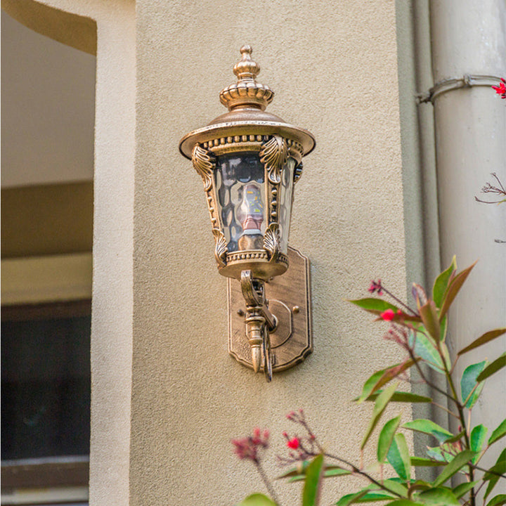 "Outdoor vintage glass wall lantern with aluminum frame, ideal for gardens, porches, providing warm and stylish ambiance."