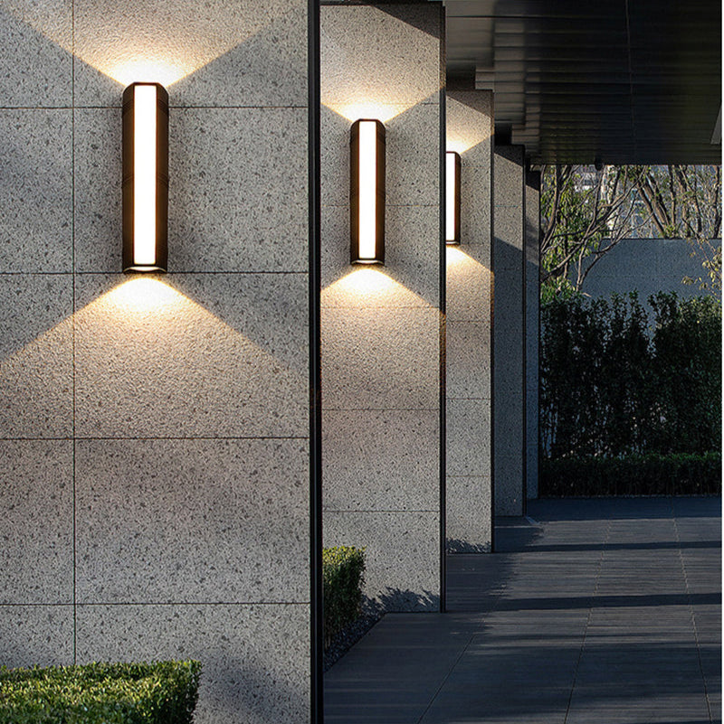 Outdoor wall light with LED technology, rustproof aluminum, sleek design, waterproof, ideal for garden or patio lighting.