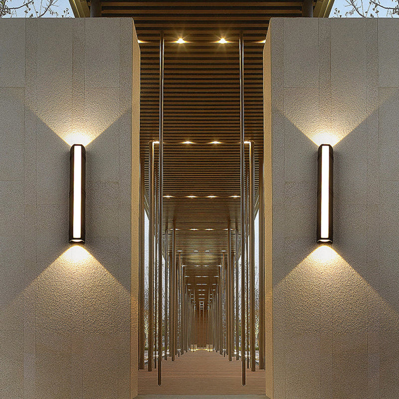 Outdoor wall light with LED technology, rustproof aluminum, sleek design, waterproof, ideal for garden or patio lighting.