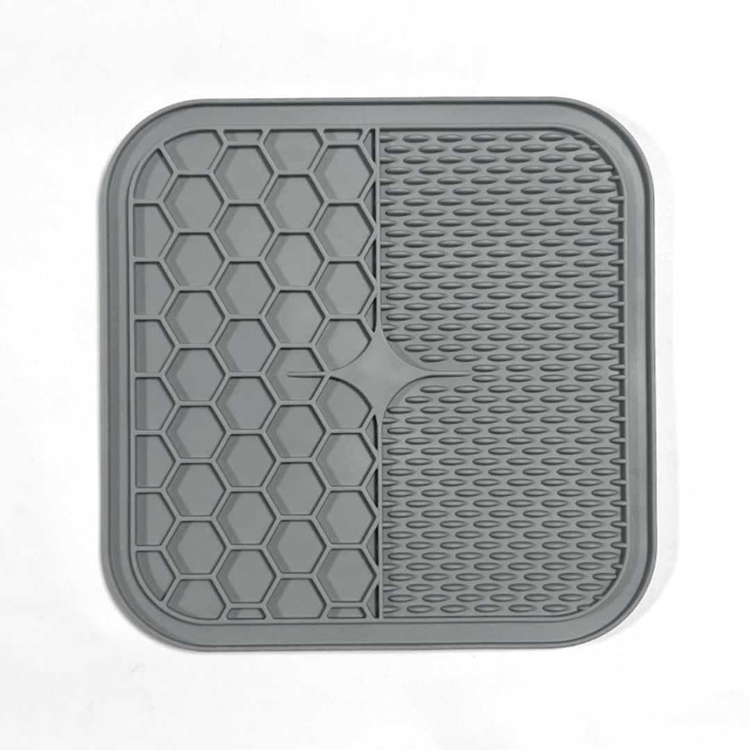 "Pet silicone lick mat in vibrant colors for stress relief and slow feeding; features textured surface for pets' wellness."