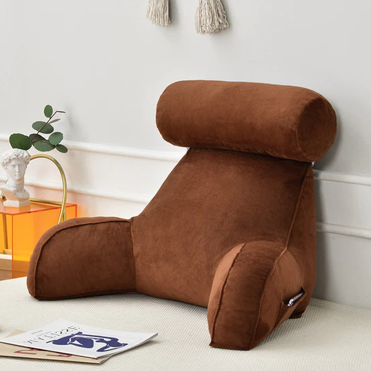 "Plush backrest pillow with arms, adjustable headrest, soft velour cover, ergonomic design for neck and back support."