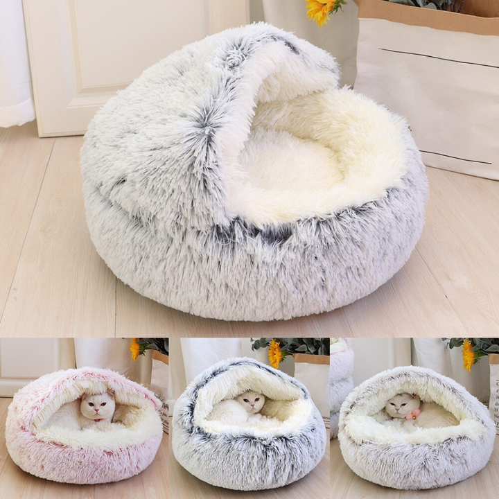 "Plush cat cuddle cave with hood, featuring a cozy, covered design for warmth and comfort in pet supplies product."