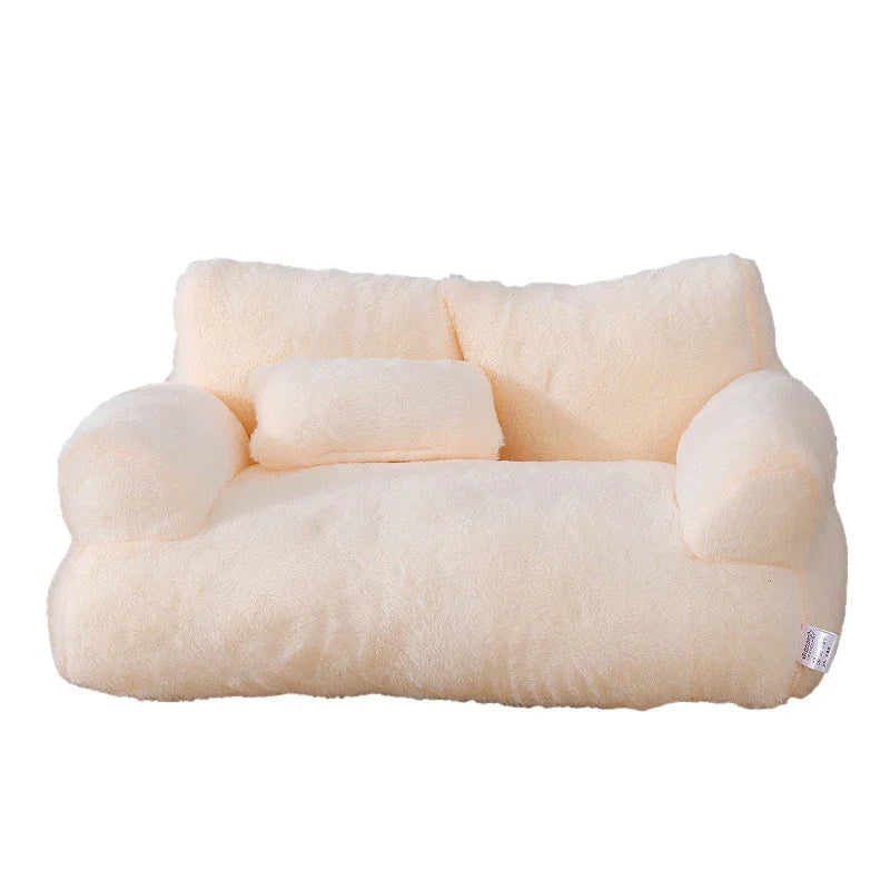 "Plush dog sofa bed in beige, features raised edges for security, soft cushioning for comfort, available in versatile sizes."