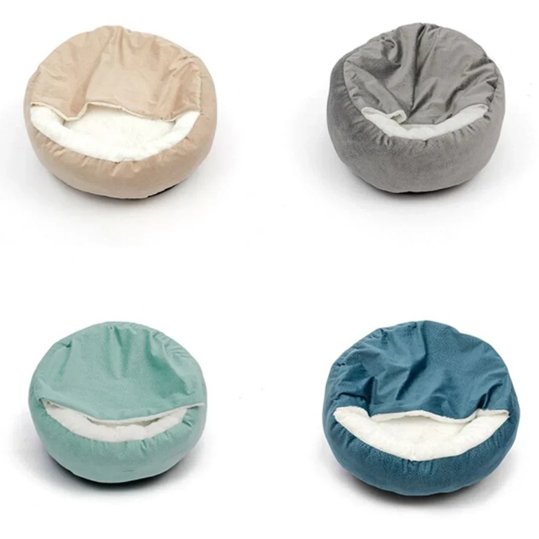 "Plush faux fur pet cave bed for cats and dogs, beige color, offering cozy comfort and security with orthopedic support."