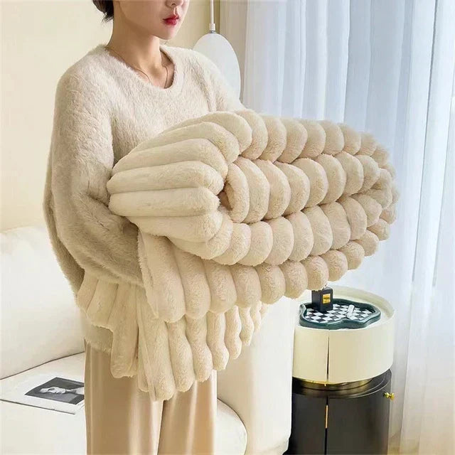 Ultra-soft plush comfort blanket, designed for supreme warmth and a luxurious feel. Ideal cozy throw.