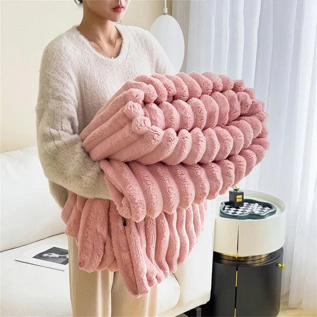 Warm & plush luxury throw blanket, perfect for cozying up on the sofa or adding elegance to bedding.