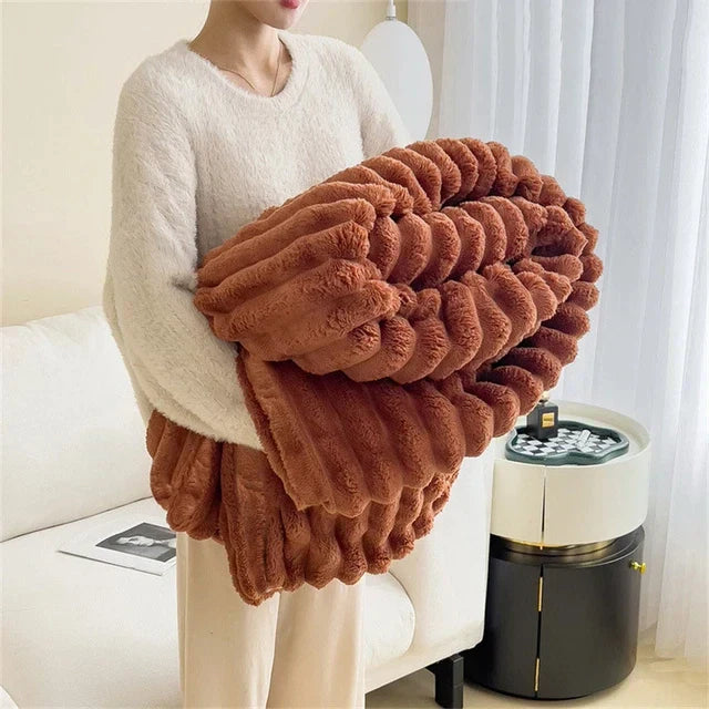 Premium plush blanket, a luxurious gift idea for ultimate relaxation, warmth, and cozy home ambiance.