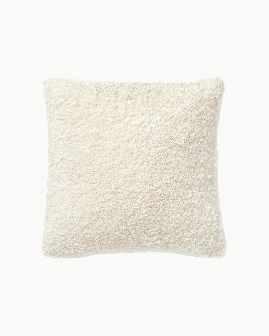 Cozy plush teddy cushion cover. Fluffy throw pillow for bedroom or living room decor.