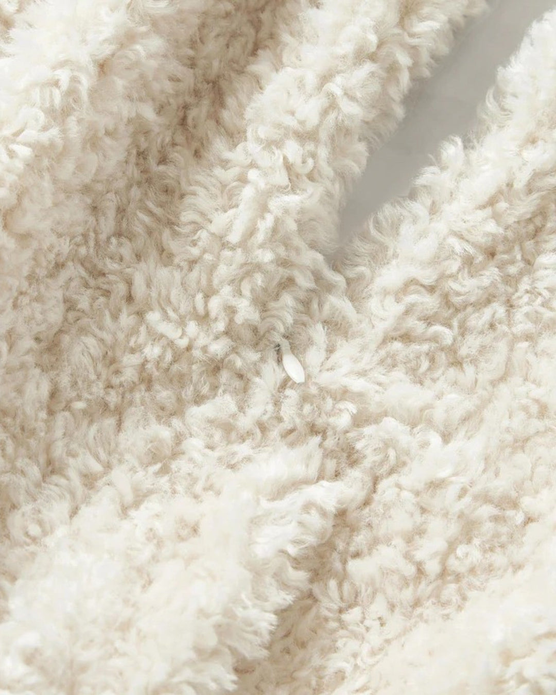 Warm plush teddy cushion cover. Super soft fluffy throw pillow for cozy winter home decor.