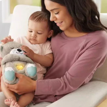 Plush teddy for kids with glowing nightlight, soothing heartbeat, realistic breathing; provides comfort and relaxation.