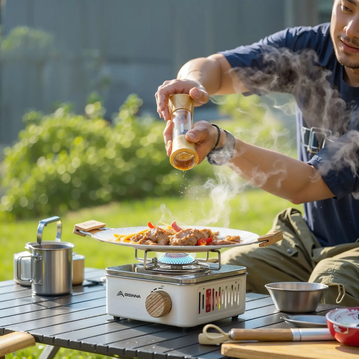 "Portable 2800W camping gas stove with compact design and carry case for efficient outdoor cooking and stability."
