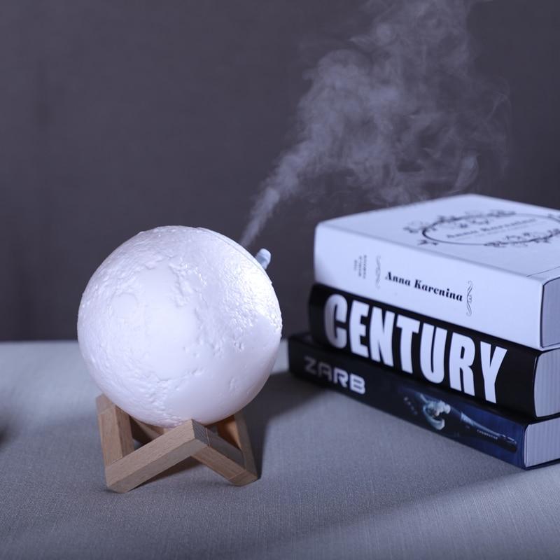 Multifunctional air purifier, humidifier, and moon lamp. USB portable design for clean air & ambient light.