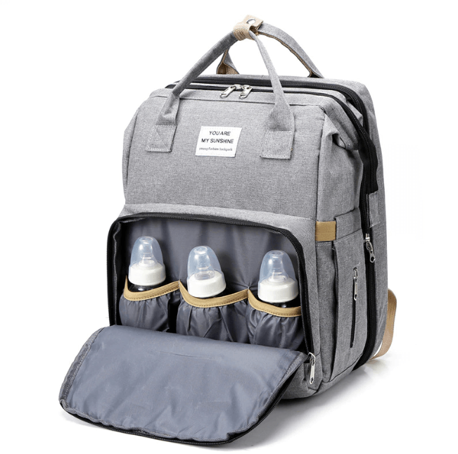 High-quality waterproof baby bag and portable bed for hassle-free baby travel.