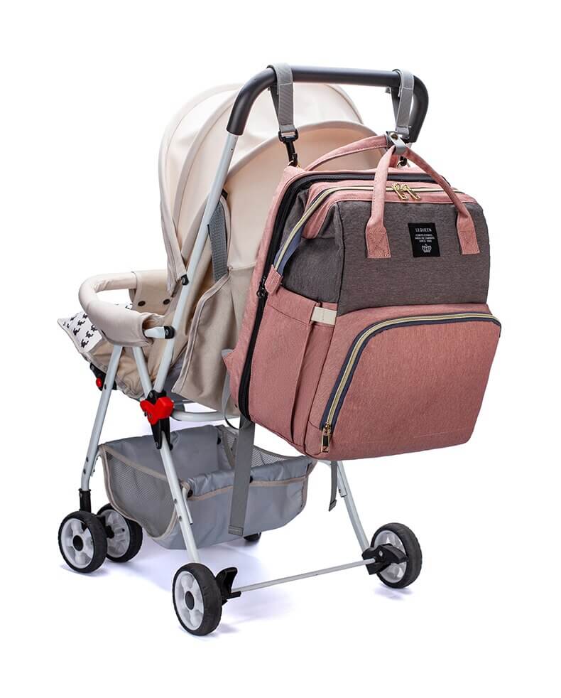 Smart parenting solution: portable baby bed, diaper bag, & changing station in one backpack.