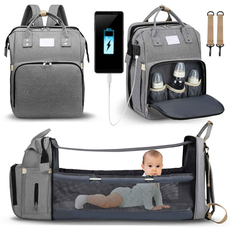 New parent's essential: multi-function travel backpack, portable baby bed, & changing pad.
